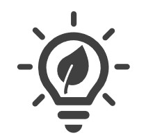 Glühbirne mit einem Blatt in der Mitte Glühbirne mit einem Blatt in der Mitte